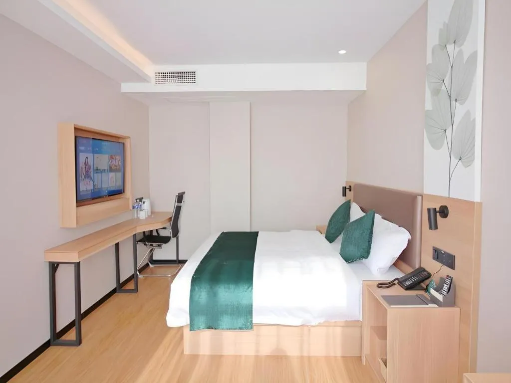 Bed in GreenTree Inn Express Zhangjiagang Hexing Town Shazhou Professional Institue of Technology