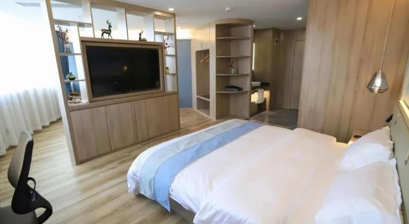 Bed in VX Hotel Jiangsu Taizhou Xinghua RT-Mart