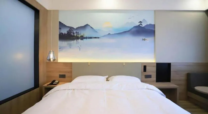 Bed in VX Hotel Jiangsu Taizhou Xinghua RT-Mart