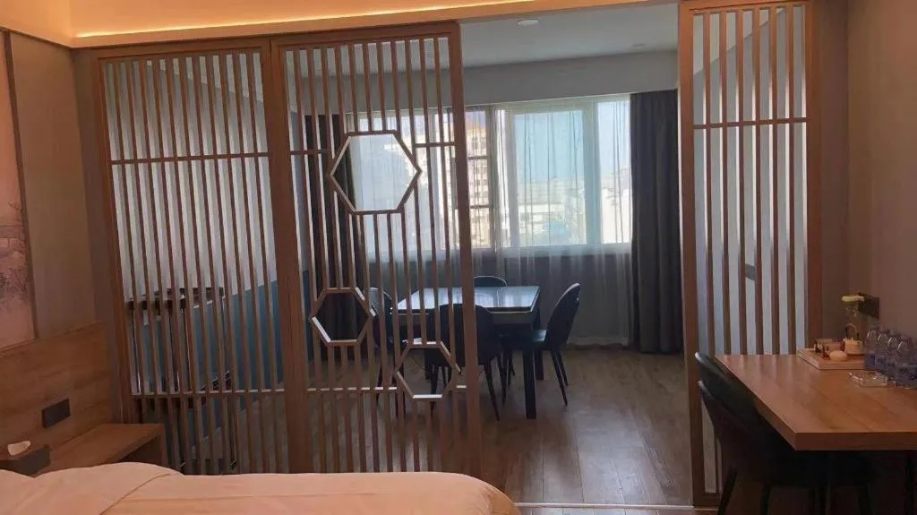 Bed in VX Hotel Jiangsu Taizhou Xinghua RT-Mart