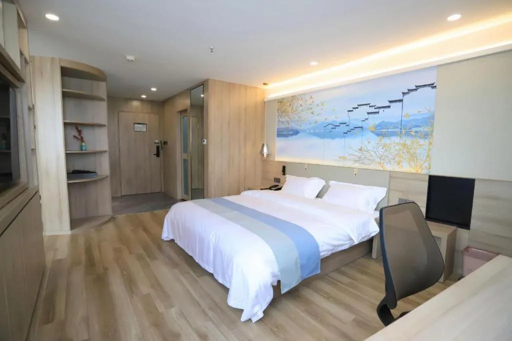 Bed in VX Hotel Jiangsu Taizhou Xinghua RT-Mart