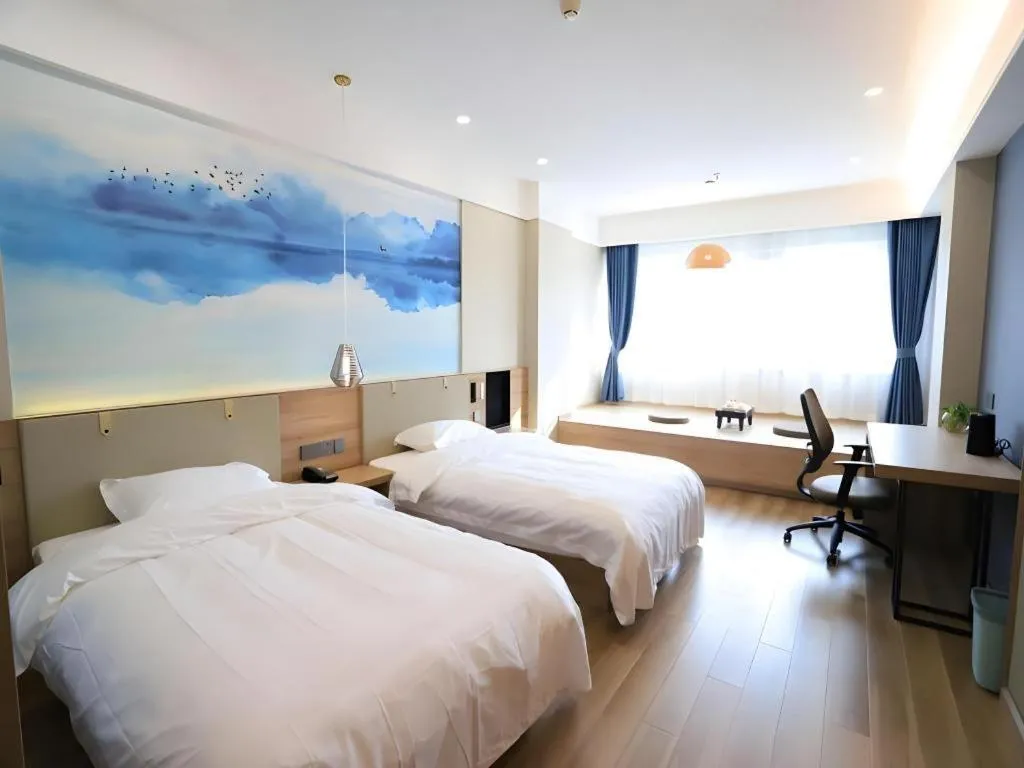 Bed in VX Hotel Jiangsu Taizhou Xinghua RT-Mart