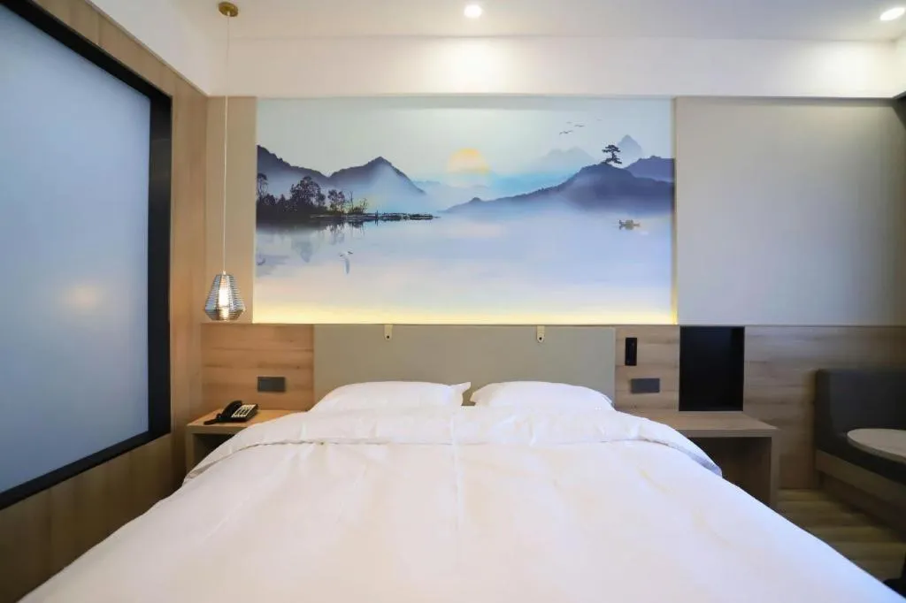 Bed in VX Hotel Jiangsu Taizhou Xinghua RT-Mart