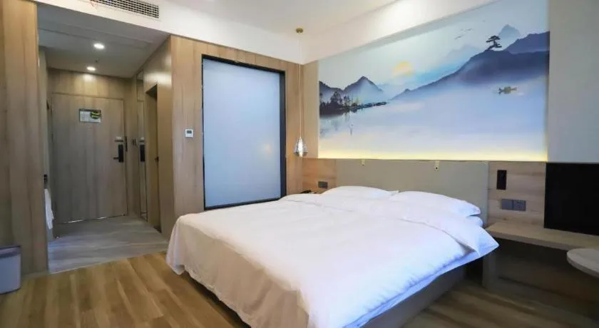 Bed in VX Hotel Jiangsu Taizhou Xinghua RT-Mart