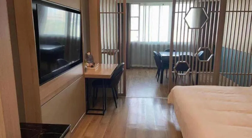 Bed in VX Hotel Jiangsu Taizhou Xinghua RT-Mart