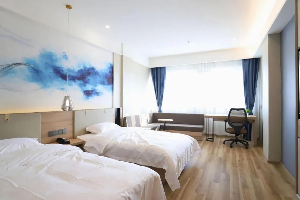 Bed in VX Hotel Jiangsu Taizhou Xinghua RT-Mart