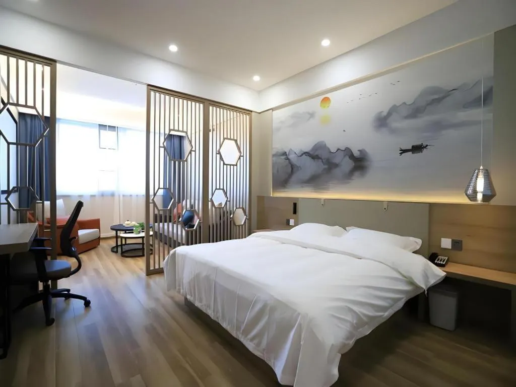 Bed in VX Hotel Jiangsu Taizhou Xinghua RT-Mart