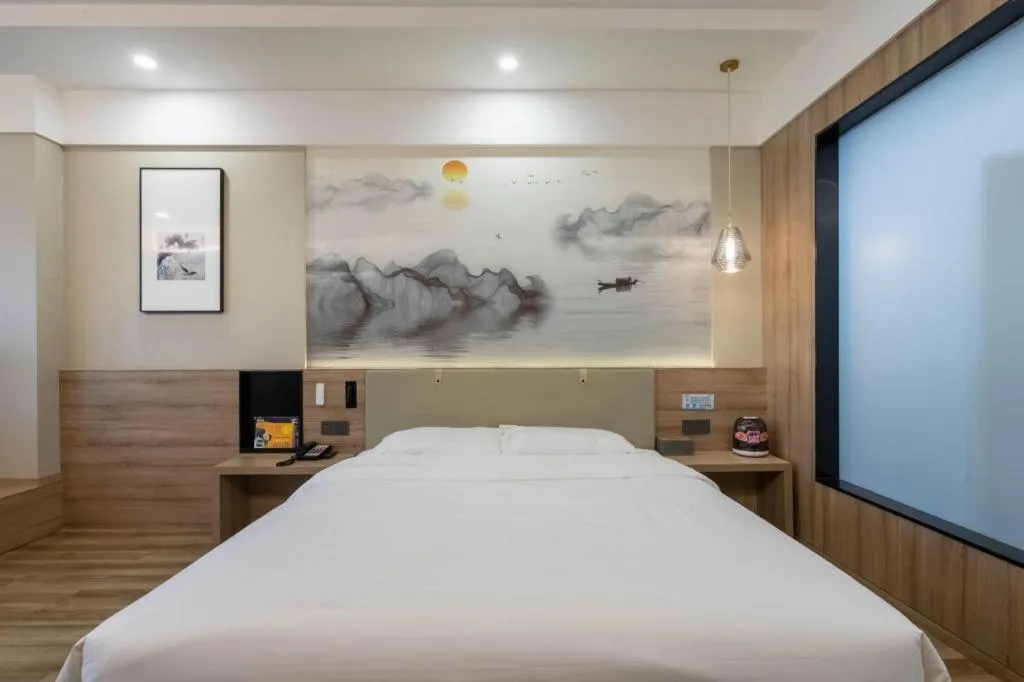 Bed in VX Hotel Jiangsu Taizhou Xinghua RT-Mart