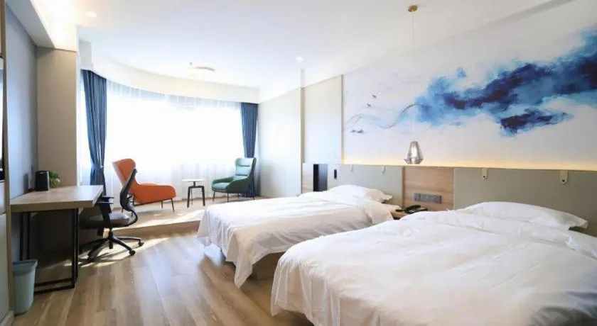 Bed in VX Hotel Jiangsu Taizhou Xinghua RT-Mart