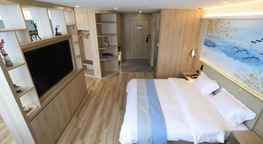 Bed in VX Hotel Jiangsu Taizhou Xinghua RT-Mart