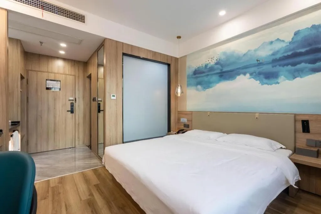 Bed in VX Hotel Jiangsu Taizhou Xinghua RT-Mart