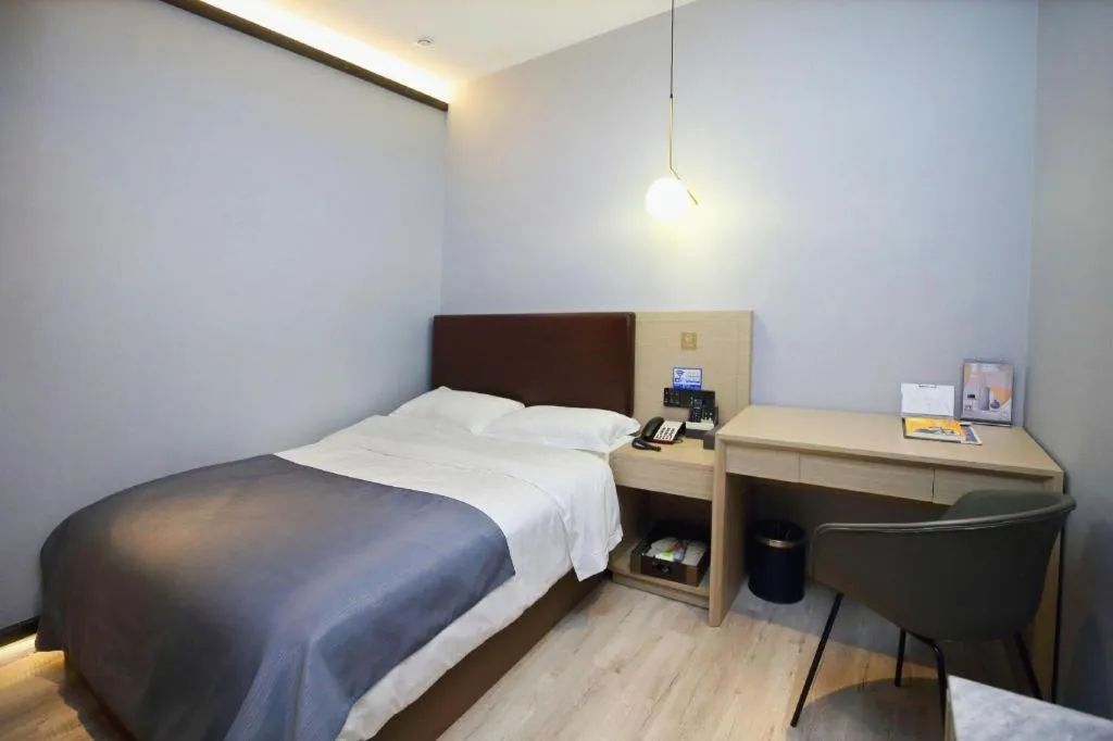 Bed in Gya Hotel Wuxi Hubin Commercial Street Tai Lake Scenic Area