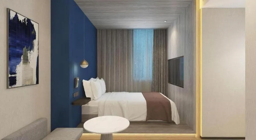 Bed in Gya Hotel Wuxi Hubin Commercial Street Tai Lake Scenic Area