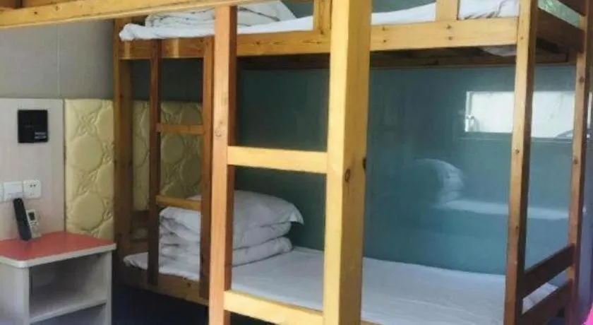 Bed in Shell Hotel Shanghai Expo Changqing Road Metro Station