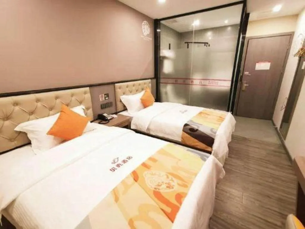 Bed in Shell Hotel Shanghai Jinshan Wanda Plaza