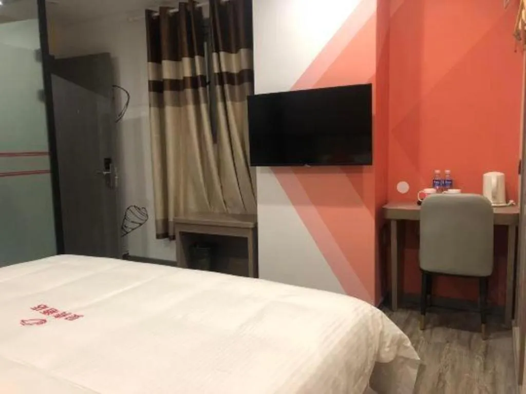 Bed in Shell Hotel Shanghai Jinshan Wanda Plaza