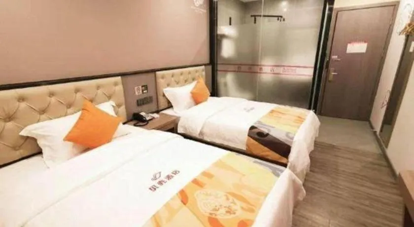 Bed in Shell Hotel Shanghai Jinshan Wanda Plaza