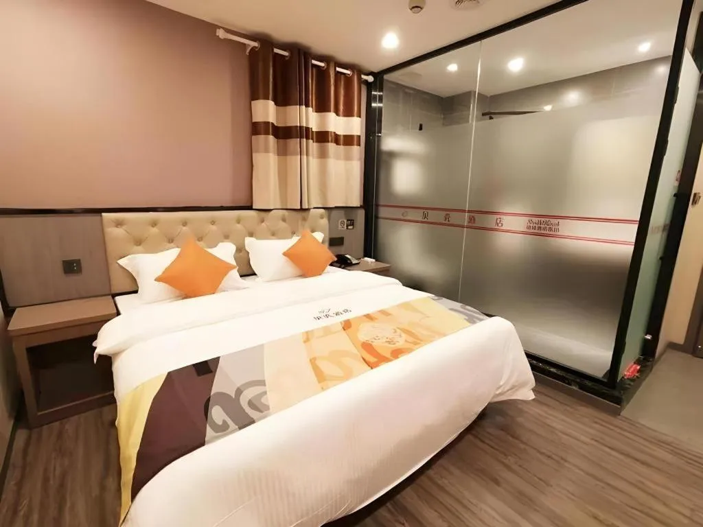 Bed in Shell Hotel Shanghai Jinshan Wanda Plaza
