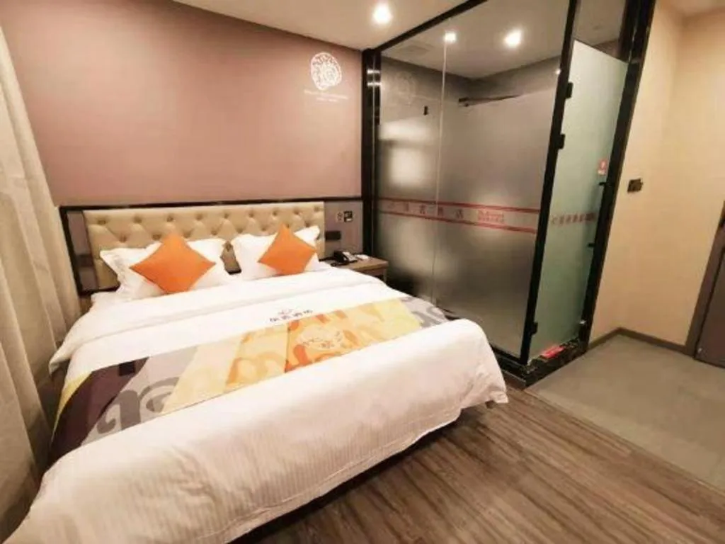 Bed in Shell Hotel Shanghai Jinshan Wanda Plaza