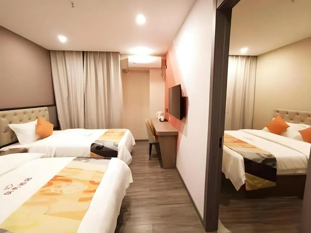 Bed in Shell Hotel Shanghai Jinshan Wanda Plaza
