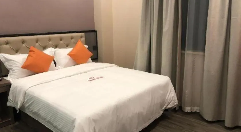 Bed in Shell Hotel Shanghai Jinshan Wanda Plaza