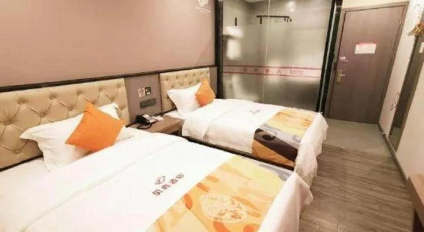 Bed in Shell Hotel Shanghai Jinshan Wanda Plaza