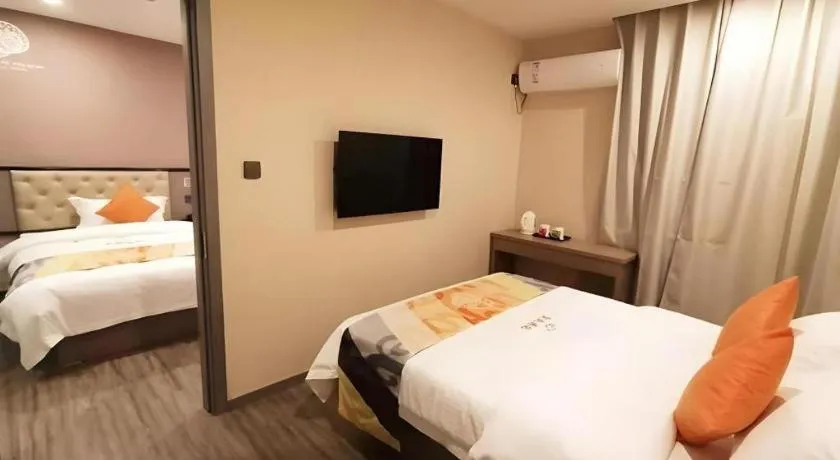 Bed in Shell Hotel Shanghai Jinshan Wanda Plaza