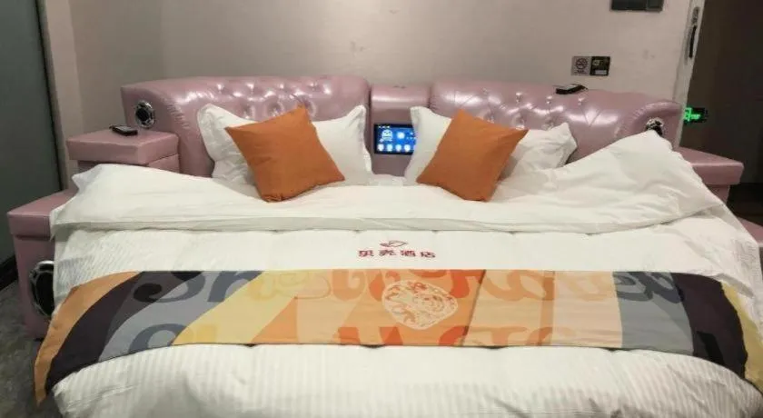 Bed in Shell Hotel Shanghai Jinshan Wanda Plaza