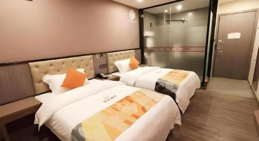 Bed in Shell Hotel Shanghai Jinshan Wanda Plaza