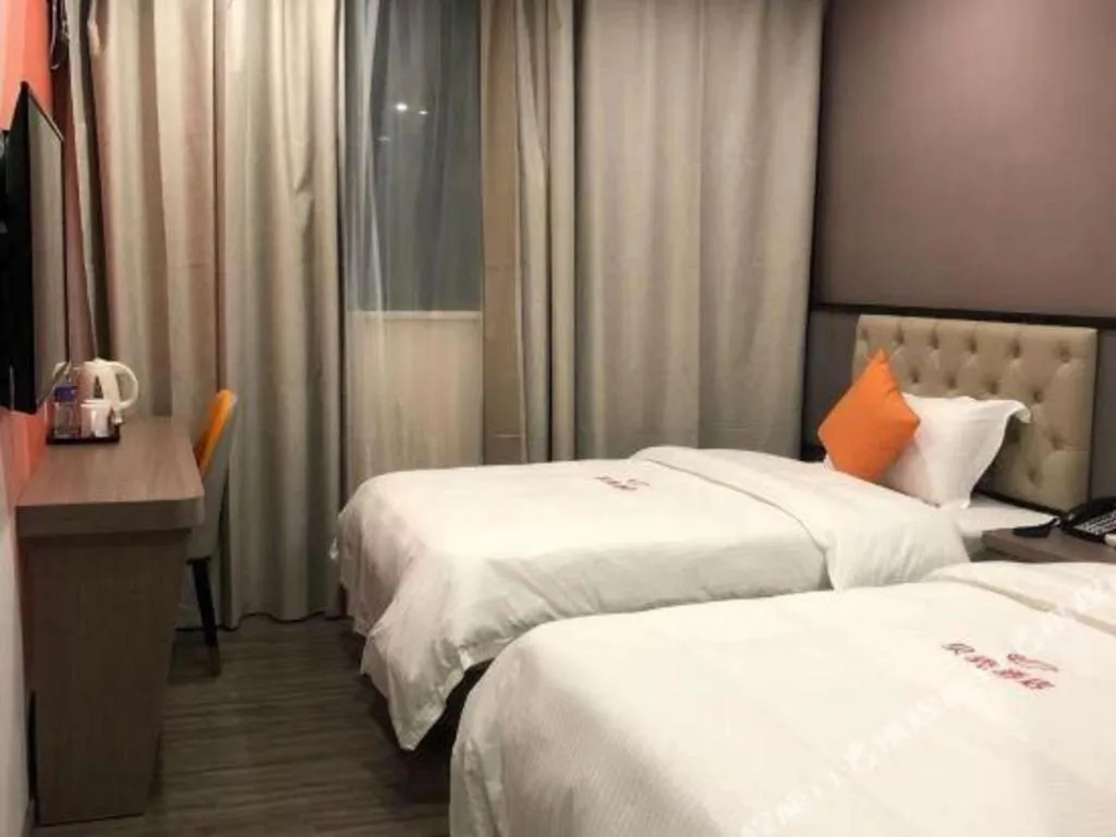Bed in Shell Hotel Shanghai Jinshan Wanda Plaza