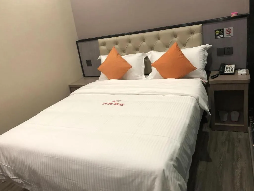 Bed in Shell Hotel Shanghai Jinshan Wanda Plaza