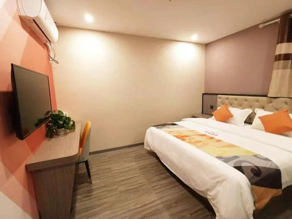 Bed in Shell Hotel Shanghai Jinshan Wanda Plaza