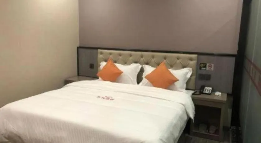 Bed in Shell Hotel Shanghai Jinshan Wanda Plaza
