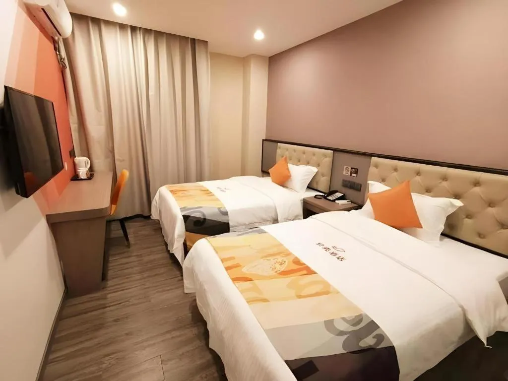 Bed in Shell Hotel Shanghai Jinshan Wanda Plaza