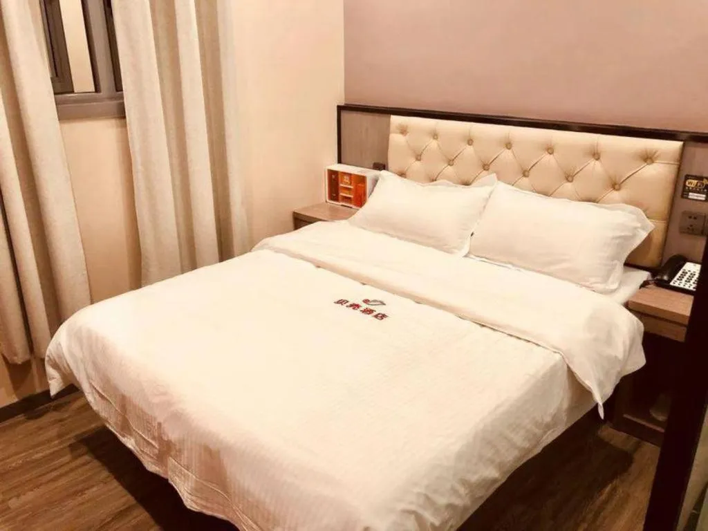 Bed in Shell Hotel Shanghai Jinshan Wanda Plaza