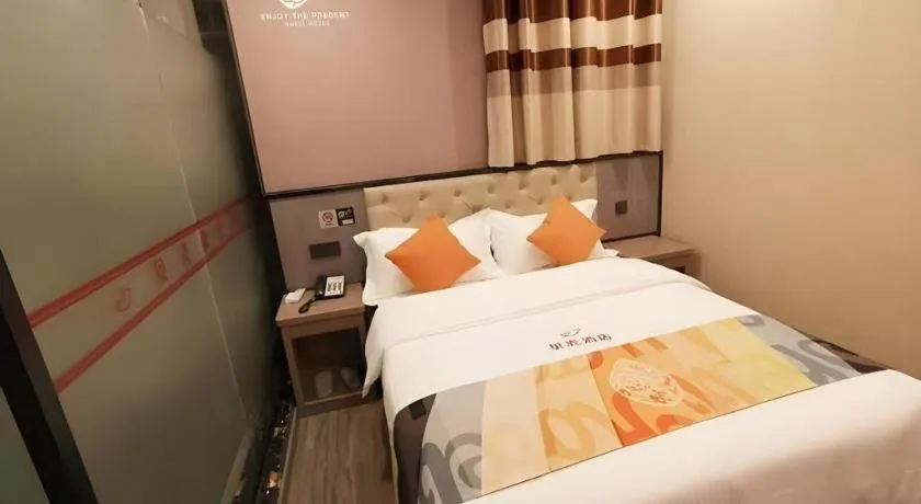 Bed in Shell Hotel Shanghai Jinshan Wanda Plaza
