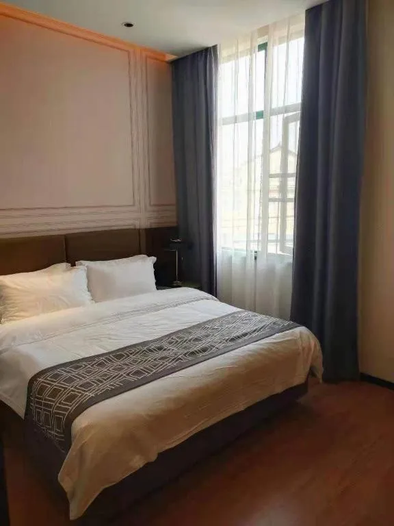 Bed in GEM Hotel Anqing Wangjiang County Economic Development Zone Fengqi Road