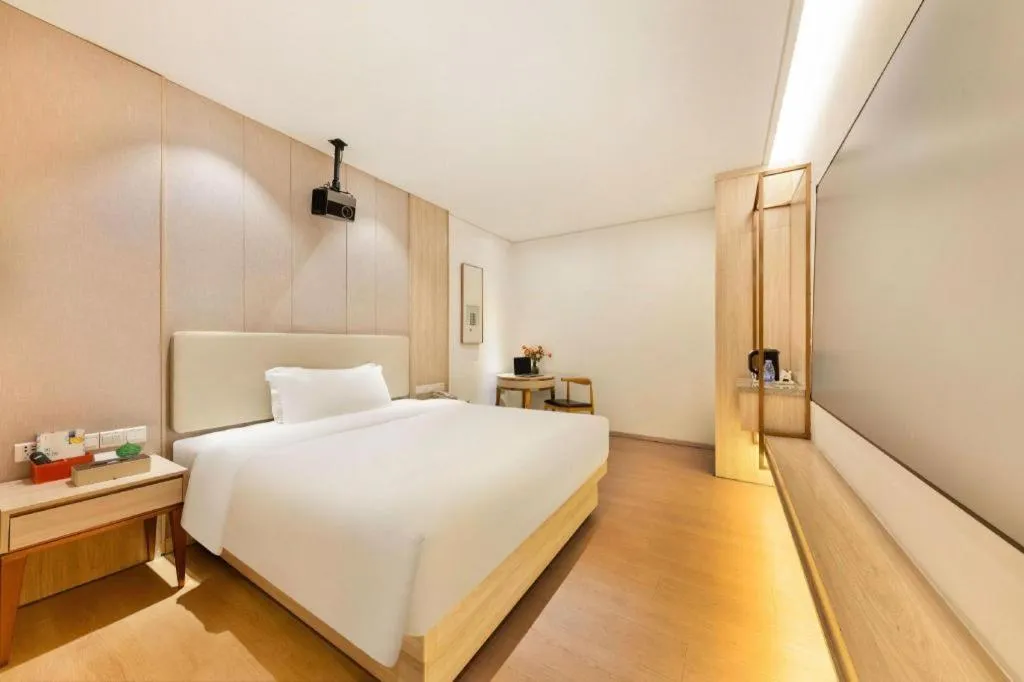 Bed in GreenTree Eastern Hotel Shenzhen Nanshan District Qianhai Free Trade Zone Lilin Metro Station