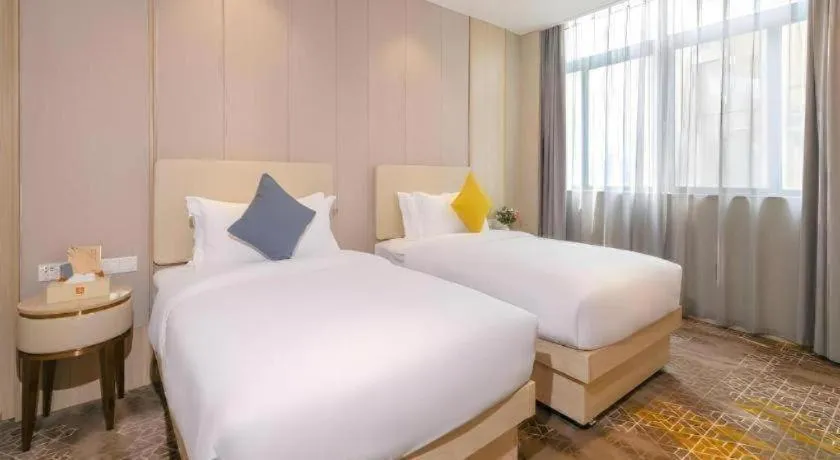 Bed in GreenTree Eastern Hotel Shenzhen Nanshan District Qianhai Free Trade Zone Lilin Metro Station