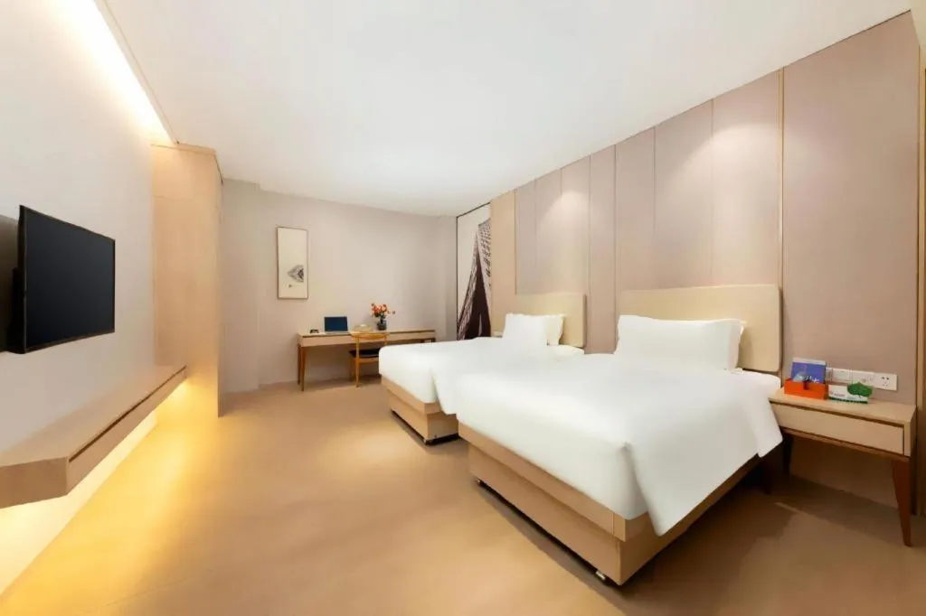 Bed in GreenTree Eastern Hotel Shenzhen Nanshan District Qianhai Free Trade Zone Lilin Metro Station