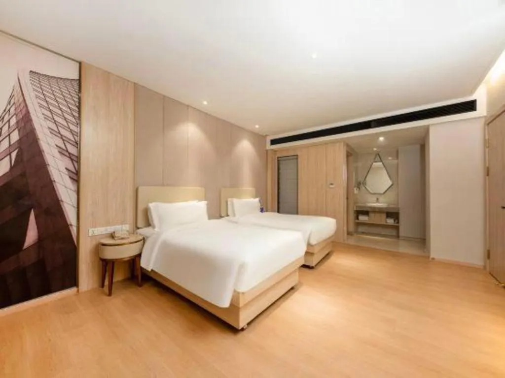 Bed in GreenTree Eastern Hotel Shenzhen Nanshan District Qianhai Free Trade Zone Lilin Metro Station