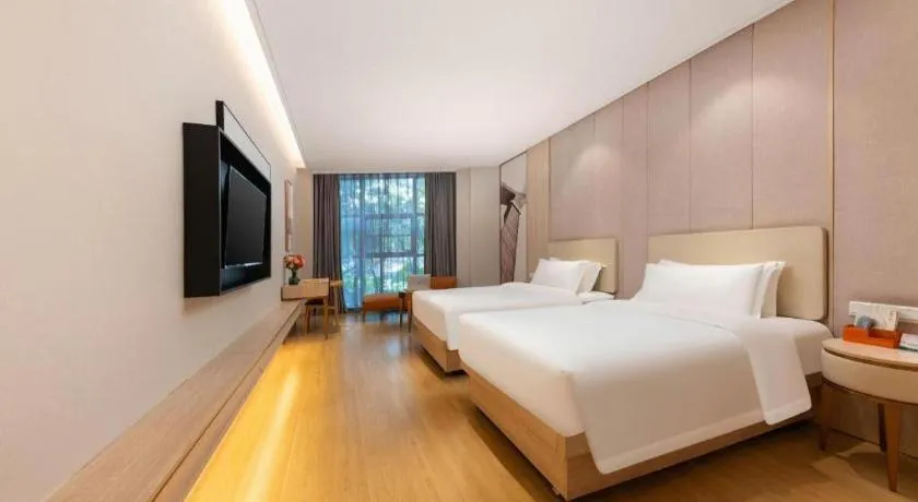 Bed in GreenTree Eastern Hotel Shenzhen Nanshan District Qianhai Free Trade Zone Lilin Metro Station