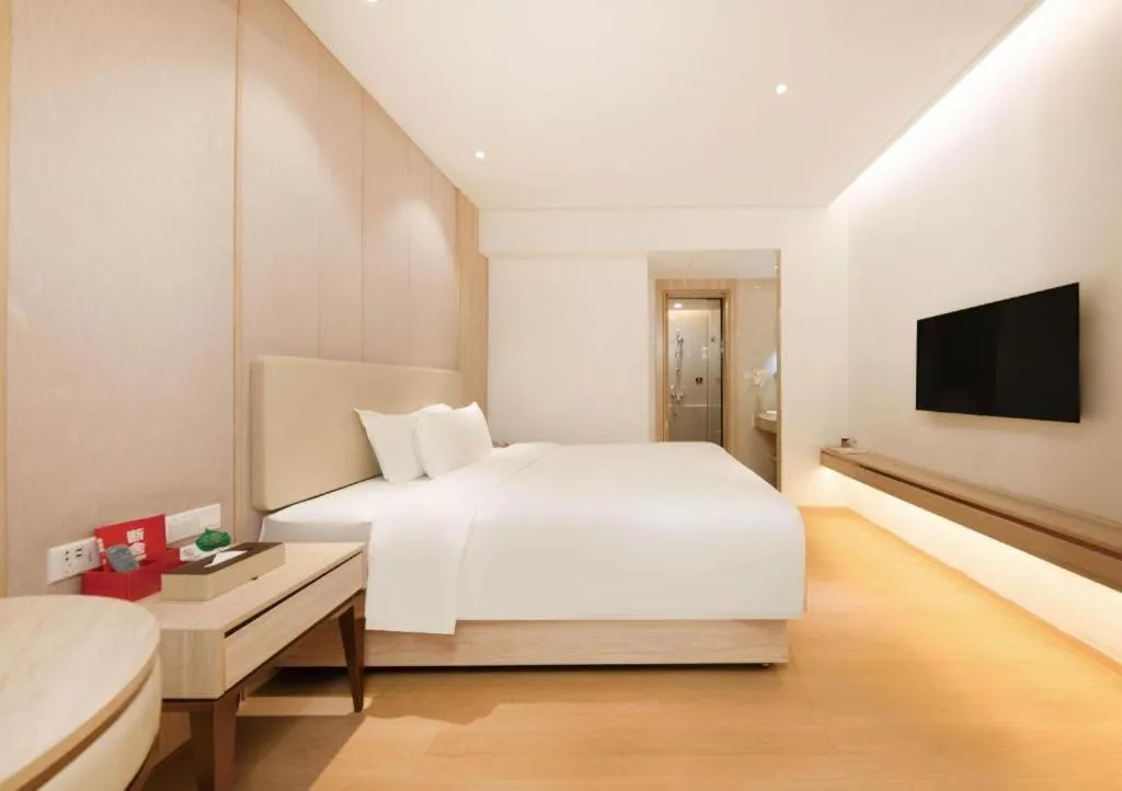 Bed in GreenTree Eastern Hotel Shenzhen Nanshan District Qianhai Free Trade Zone Lilin Metro Station
