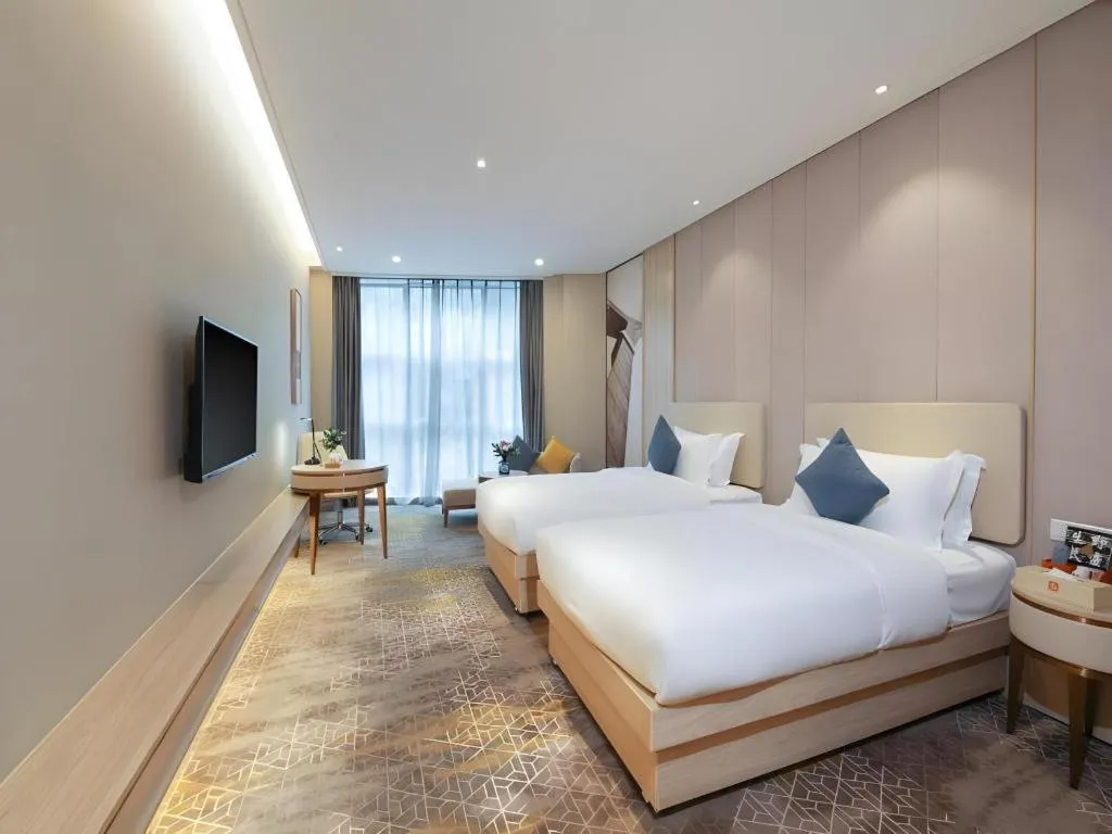 Bed in GreenTree Eastern Hotel Shenzhen Nanshan District Qianhai Free Trade Zone Lilin Metro Station