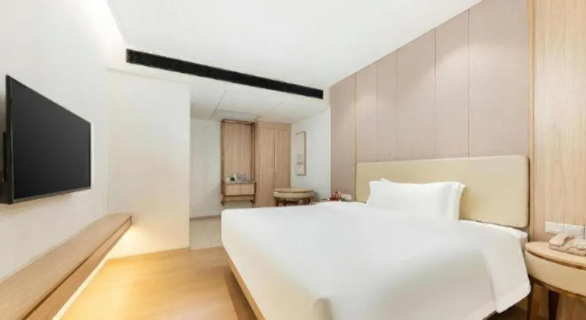 Bed in GreenTree Eastern Hotel Shenzhen Nanshan District Qianhai Free Trade Zone Lilin Metro Station