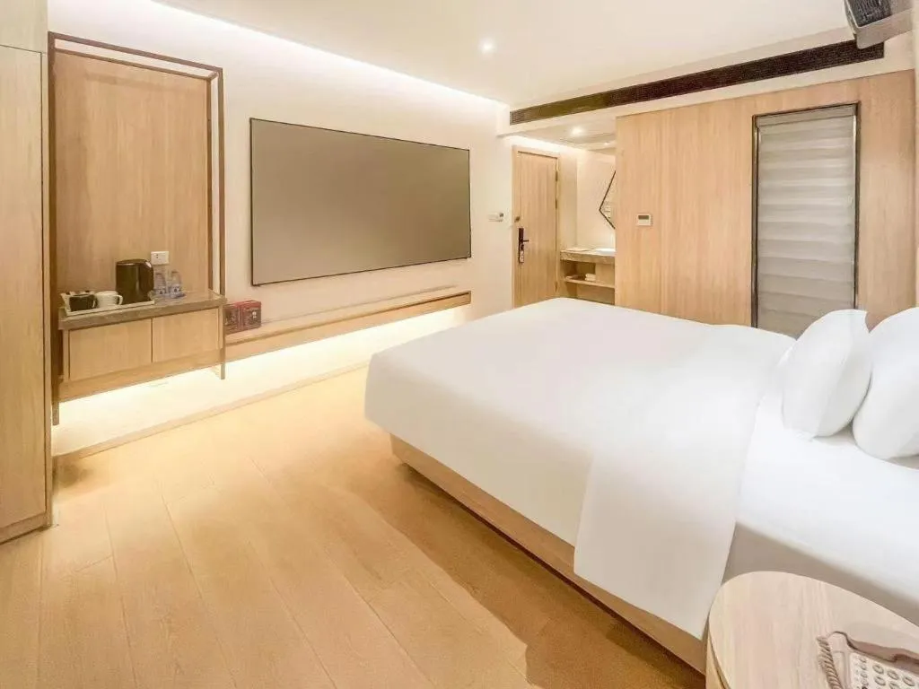 Bed in GreenTree Eastern Hotel Shenzhen Nanshan District Qianhai Free Trade Zone Lilin Metro Station