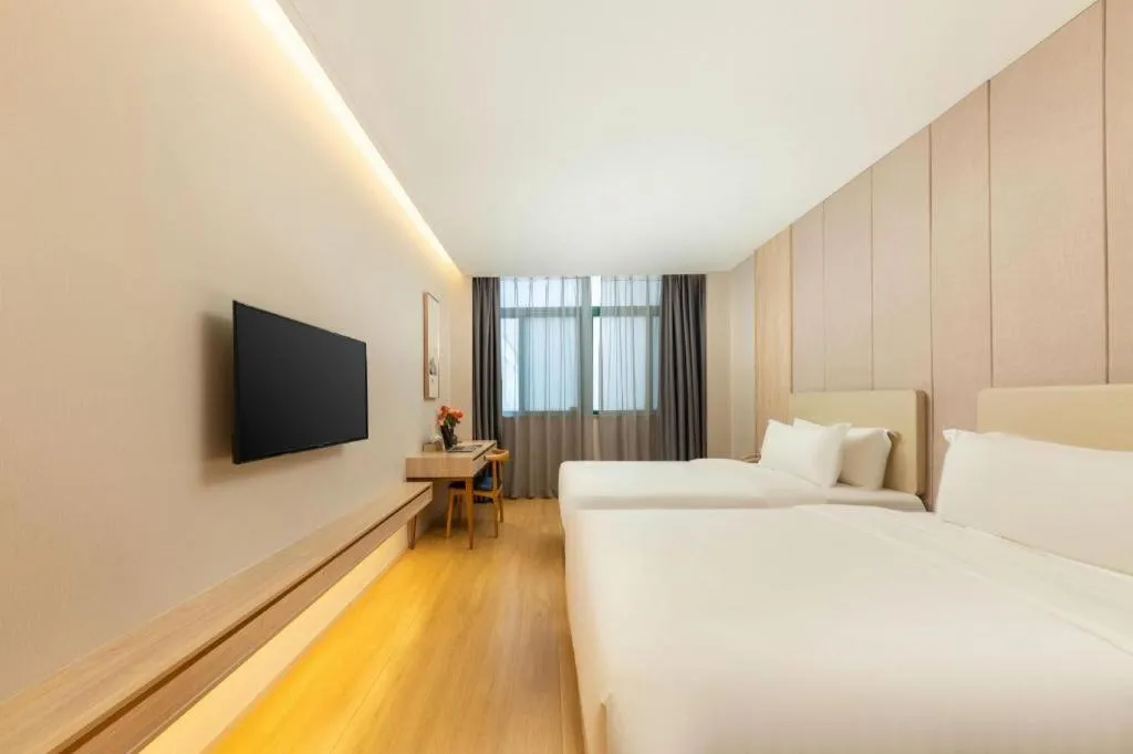Bed in GreenTree Eastern Hotel Shenzhen Nanshan District Qianhai Free Trade Zone Lilin Metro Station