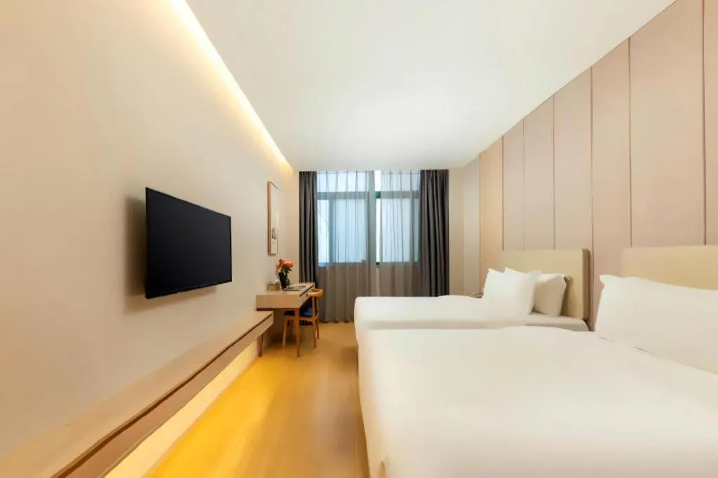 Bed in GreenTree Eastern Hotel Shenzhen Nanshan District Qianhai Free Trade Zone Lilin Metro Station