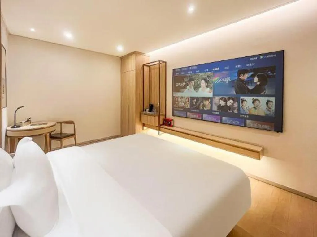 Bed in GreenTree Eastern Hotel Shenzhen Nanshan District Qianhai Free Trade Zone Lilin Metro Station