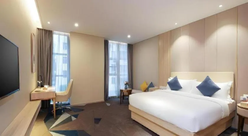 Bed in GreenTree Eastern Hotel Shenzhen Nanshan District Qianhai Free Trade Zone Lilin Metro Station